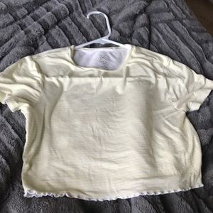 A white and yellow cropped top